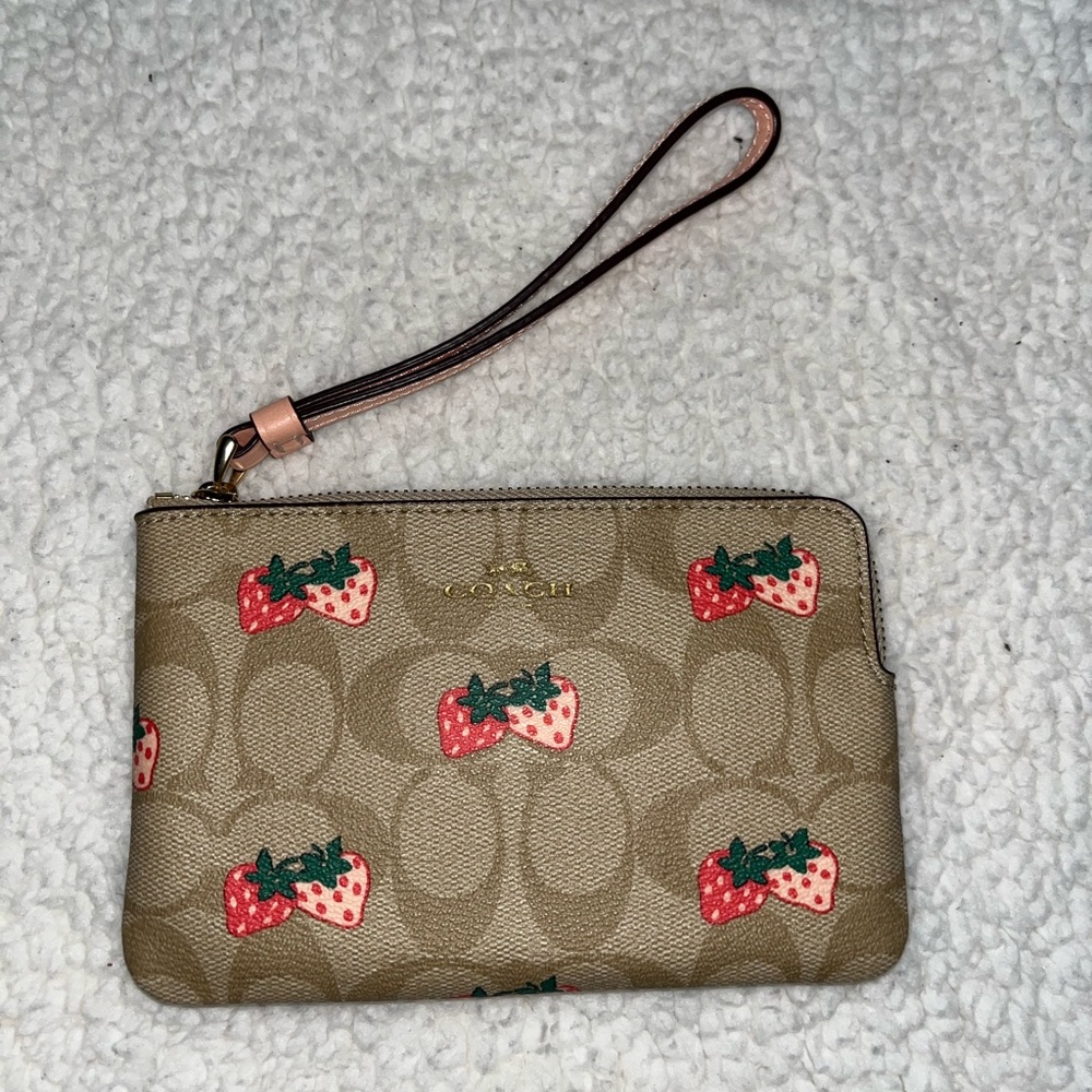 Coach Tan Wristlet with Red Strawberry Design